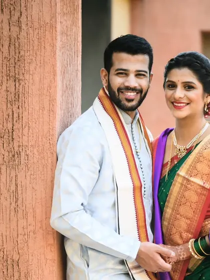 A classic portrait of the couple looking directly at the camera. They both look so happy and ready for their big day.