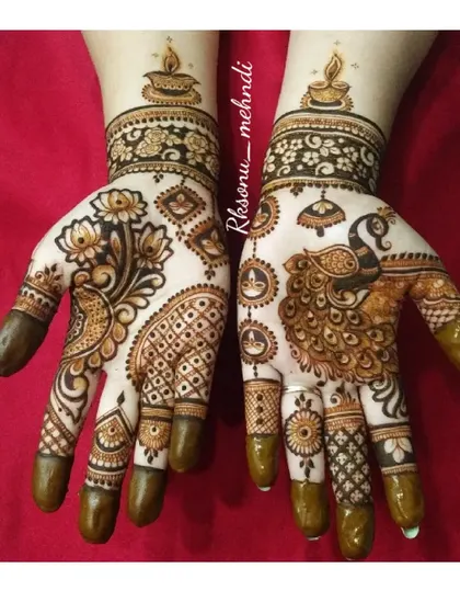 This gallery showcases a variety of my traditional designs. You'll find classic elements like peacocks, elephants, lotuses, and intricate jaali (net) patterns, all expertly crafted to create timeless beauty.