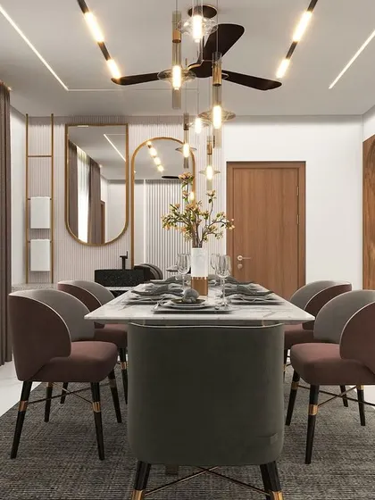 A visualization of a dining space that feels both modern and warm. The design uses elegant mirrors, pendant lighting, and a neutral color palette to create a sophisticated atmosphere for meals.