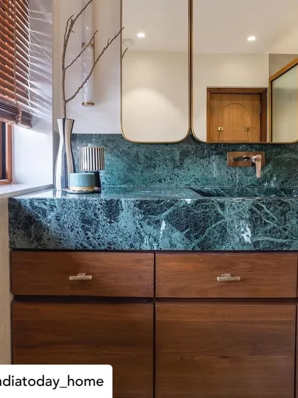 Our "Bold & Balanced" home was published in India Today Home. This feature showcased the luxurious master bathroom, highlighting the use of green marble and custom woodwork.