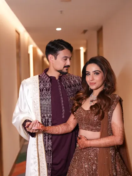 The connection between a couple is what makes a wedding so special. Here, I styled both the bride and groom in coordinated outfits that look beautiful together without being overly matched, allowing their personal styles to shine.