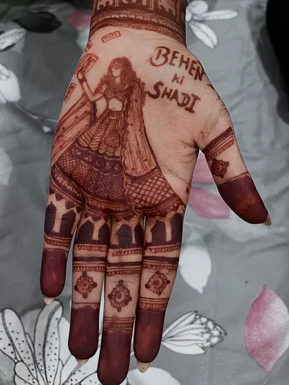 The "Behen ki Shaadi" design after the henna has dried and the stain has developed. The color is rich and beautiful.