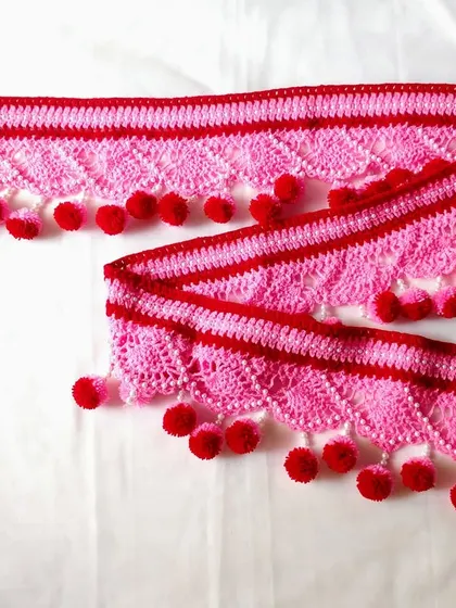 I was so excited to make this custom 7-foot long toran in pink and red. It shows how I can adapt my designs for larger spaces.