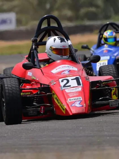 Our driver in car 21, battling for position with a competitor. The Formula LGB series provides intense, close-quarters racing experience.
