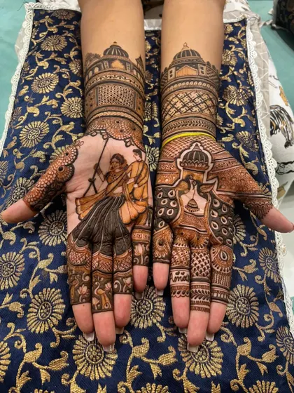 Both hands of a bride, each telling a story. One palm features a playful couple on a swing, while the other showcases traditional motifs, blending personal moments with classic bridal art.