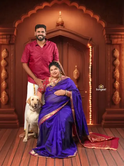 Including a beloved pet in your maternity shoot is a wonderful idea. Here, the family dog joins the expecting couple for a complete family portrait.