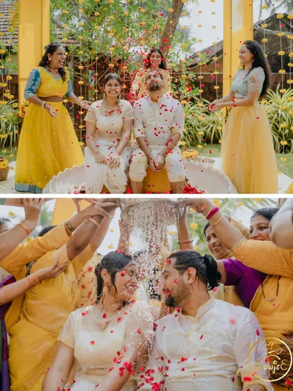 Another angle of the couple being showered with petals, showcasing the fun and love surrounding them.