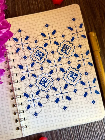 A calming blue and silver pattern. The metallic silver adds a lovely shimmer to the page.