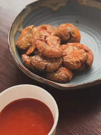 Gunpowder baby potatoes, a crispy and spicy small plate.