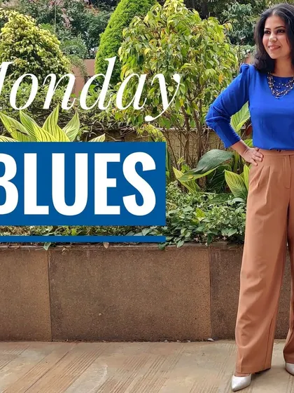 I'm driving away the Monday blues with a pop of color. This royal blue top paired with neutral brown trousers is a great way to start the week feeling confident and energized.