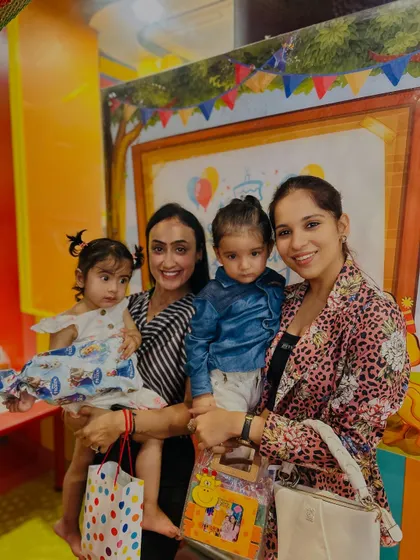 More happy faces from a birthday celebration, showcasing the friendships that form between both children and parents in our program.