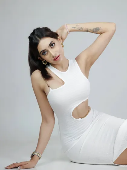 Another pose from the same series, showing a different angle and expression. Providing a variety of poses in the same outfit is key for a versatile portfolio.