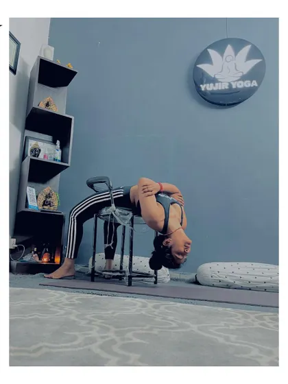 Using a chair as a prop to safely explore a deep backbend, Dvi Pada Viparita Dandasana. Props help us understand the alignment of advanced poses before we have the full strength to do them unsupported.