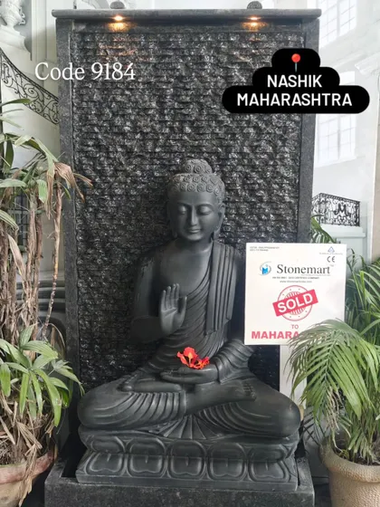 The complete black marble Buddha fountain, sold to a client in Maharashtra. This piece features two spotlights that illuminate the statue and the water flow, enhancing its beauty after dark.