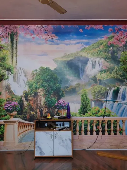 This full-wall mural creates a stunning illusion of a balcony overlooking a fantasy waterfall landscape. It dramatically opens up the room and adds a sense of depth and wonder.