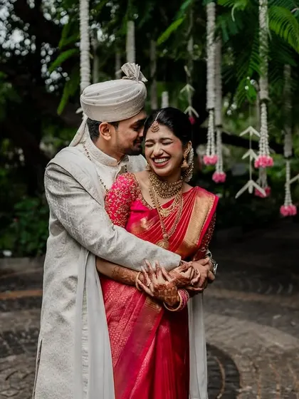 A candid moment of pure laughter and joy. We love capturing the uninhibited happiness of our couples, creating photos that are full of life and energy.