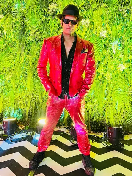 This is the closest I could get to dressing like Santa for a Christmas-themed sangeet in Vadodara. The red hot suit definitely brought the festive fire.