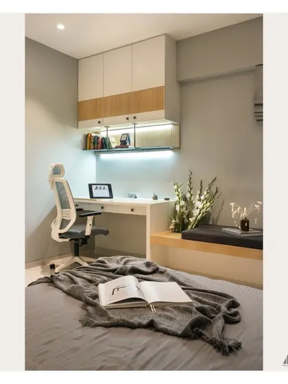 A closer look at the integrated study area within the bedroom. The design includes overhead storage and task lighting, making it a functional workspace without compromising the room's restful feel.