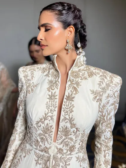 A close-up of the finished look for the Manish Malhotra show. I focused on creating an intense, healthy glow on the high points of the face, paired with a sleek braided updo for a regal finish.
