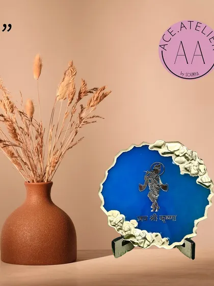 This 5-inch Krishna frame is another beautiful option, featuring a standing Krishna against a royal blue background. It's a perfect small gift.