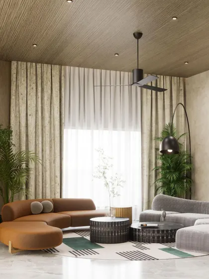 A render of a cozy seating area featuring a mix of grey and warm tan sofas. The textured ceiling and large window with sheer curtains create a comfortable and light-filled space.