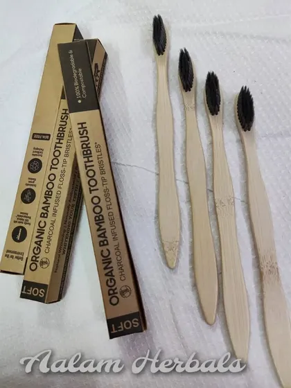 A simple, clean shot of my Organic Bamboo Toothbrushes. The handles are 100% biodegradable, and the soft, charcoal-infused bristles are gentle on your enamel and gums, making them a perfect partner for my herbal tooth powder.