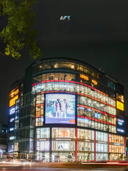 Krishna Curve, the newest luxury lifestyle destination in Mumbai. This mixed-use project features 9 levels of luxury retail, with a stunning curved glass facade that captures the high-street vibe of Linking Road.