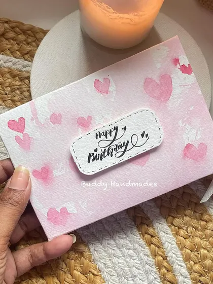 A hand-painted birthday card with a pink heart pattern. I love how the watercolor gives it a soft, dreamy look.