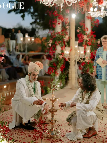 A sacred moment from the ceremony as Kahran and Gourav light the ceremonial lamp together. We worked with them to create a custom ceremony that was deeply meaningful to them, blending tradition with their personal journey.