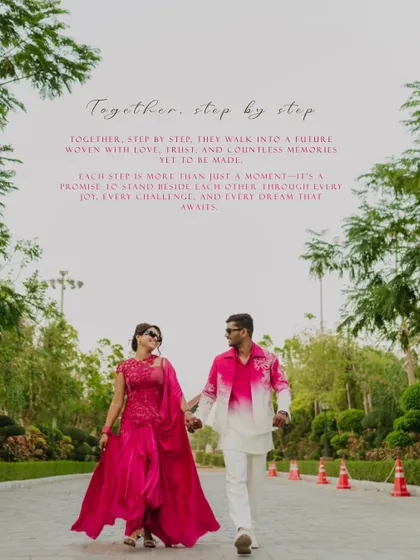 A stylish shot of the couple walking hand-in-hand, showcasing their vibrant pink coordinated outfits for their Haldi celebration.