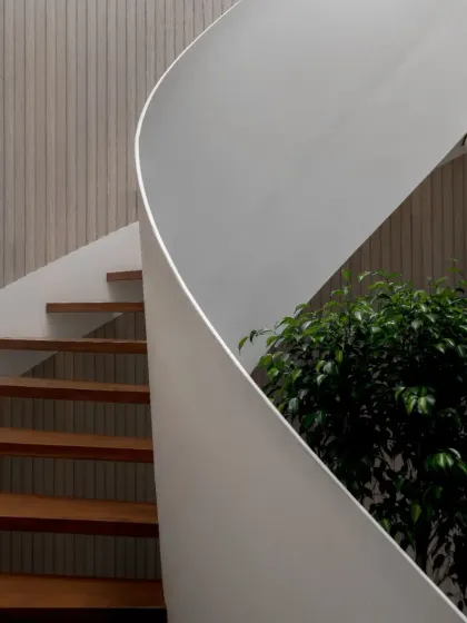 Upon entering the Hemadri penthouse, the eye is immediately drawn to the stunning helical staircase, a centerpiece that embodies contemporary elegance and structural ingenuity.