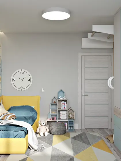 A view of the room's storage solutions, including a full-length wardrobe and modular shelving, ensuring the space stays tidy.