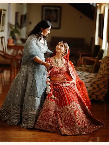 A heartwarming moment between the bride and her mother. These candid, emotional interactions are a priceless part of the wedding story.