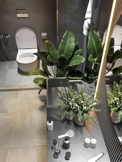 Attention to detail in a modern bathroom design. This space uses large-format grey tiles for a seamless look, with natural elements and integrated lighting to create a calm, spa-like atmosphere.
