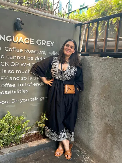 Breakfast in a bustling city is one of my passions. This photo from a cafe in Mumbai captures a moment of quiet enjoyment amidst the city's energy.