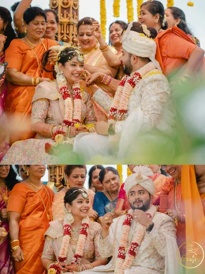 The couple sharing a smile during their wedding ceremony, surrounded by the warmth of their family.
