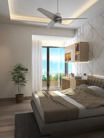 A bedroom design with a geometric-patterned wall, warm wood furniture, and a large window leading to a balcony, creating a bright and airy feel.