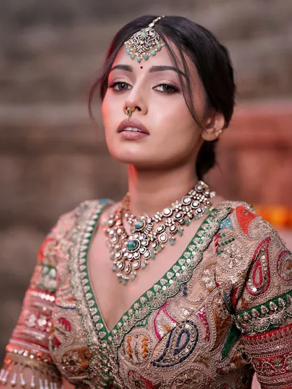 Another beautiful portrait. The soft blush and glowing skin give a look of self-love and confidence.