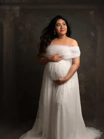 Looking towards the future. This pose captures the hope and wonder of what’s to come, with soft light and a gentle expression.