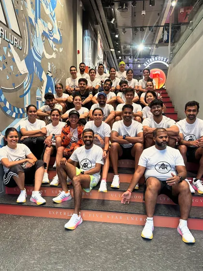 The crew taking over the stairs at the Adidas store for a group photo. Our community events are always full of energy and fun.