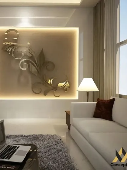 A minimalist living room concept where the focus is on a large, backlit wall art piece. The simple white sofa and ample natural light create a bright and serene environment.