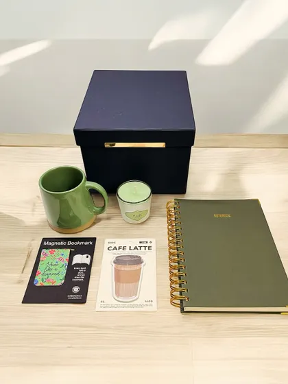 Our 'Matcha Mornings' gift set is like a gentle start to the day, all packed in a beautiful box. It includes our Sequoia notebook, a ceramic mug, a cozy musk candle, and other little treasures. We curate these sets to feel like a complete, thoughtful experience.