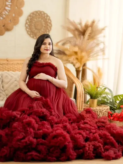 A slightly different angle of the seated portrait, capturing the mom-to-be's happy and serene expression.