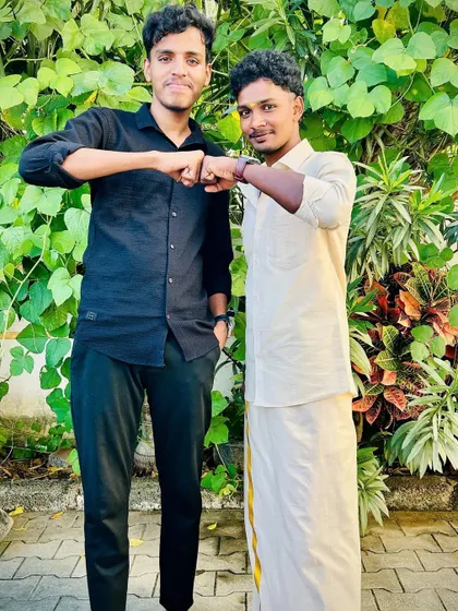 With my friend and fellow champion. We are both Thailand International Karate Champions from 2019. Sometimes we trade our karate gi for a traditional veshti.