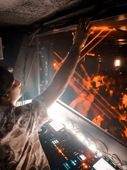 A view from above the crowd in Hyderabad, reaching out as the lasers cut through the dark.