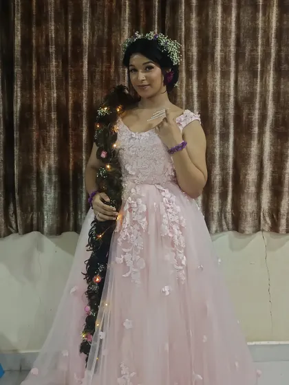 A full view of the enchanting pink gown, a lovely choice for capturing beautiful memories.