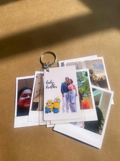 Another view of the keychain and polaroids combo. The high-quality prints are perfect for decorating a room or putting in a scrapbook.
