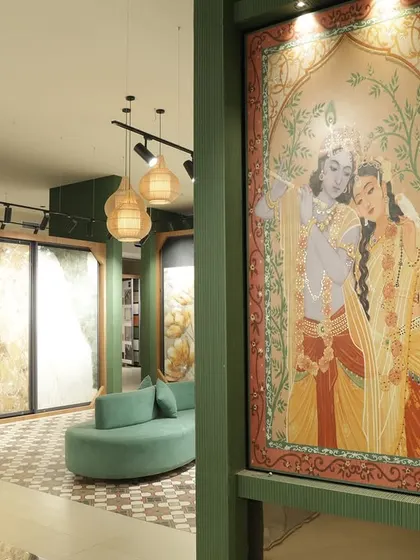 This custom Radha-Krishna tile mural is an example of how we can bring cultural artistry into your home. Set within a modern green-paneled wall, it shows how traditional themes can blend seamlessly with contemporary interior design.