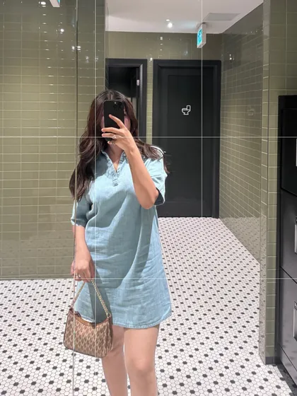 Another stylish mirror selfie of the complete Calvin Klein, Aldo, and Michael Kors outfit.