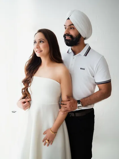 A beautiful and dreamy couple's portrait. The soft lighting and their gentle expressions create a romantic and timeless feel.